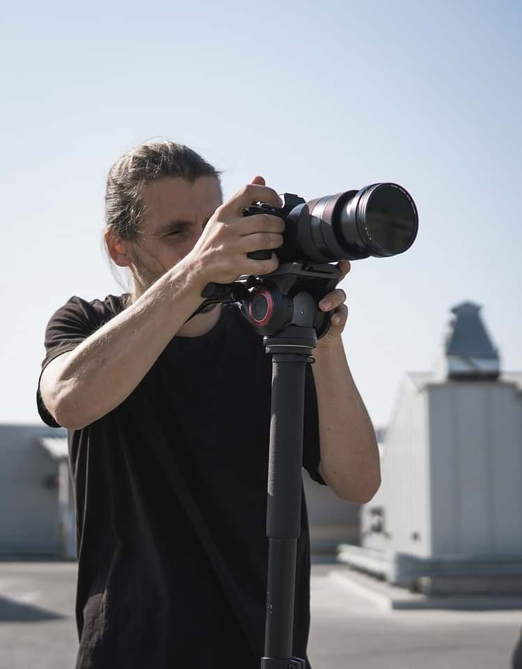 Image of Man with Camera and Tripod